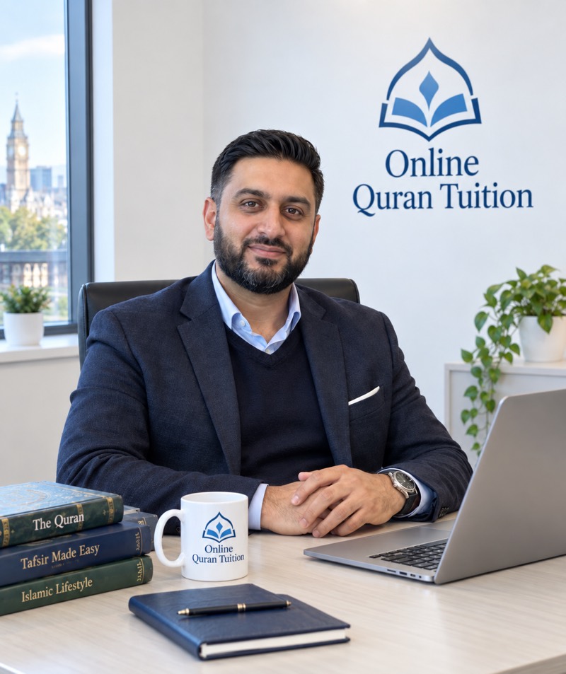 The co-founder of Online Quran Tuition at his desk in the academy office