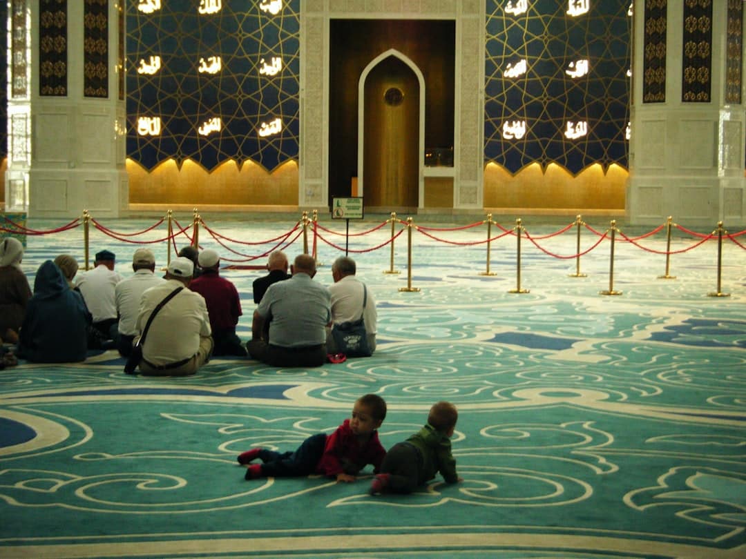 An interactive online Quran tuition session with a teacher and students.